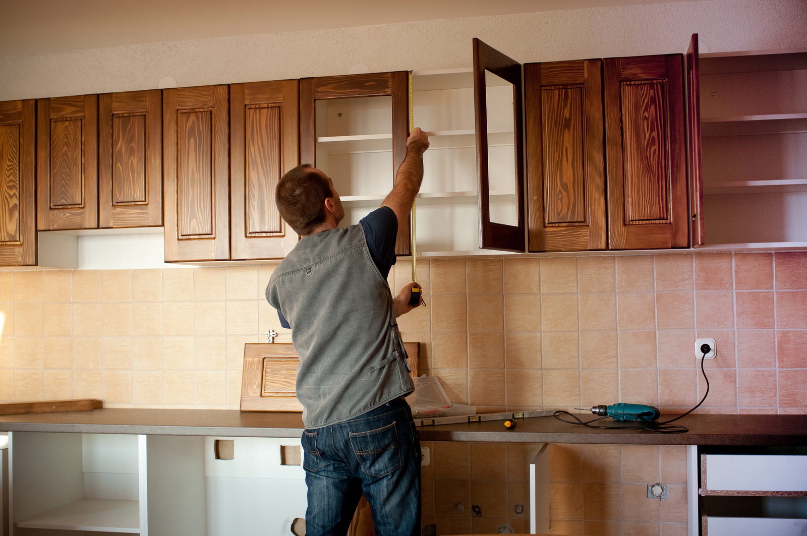 https://www.cabinetdoors.com/product_images/uploaded_images/bigstock-new-kitchen-cabinets-38181991.jpg