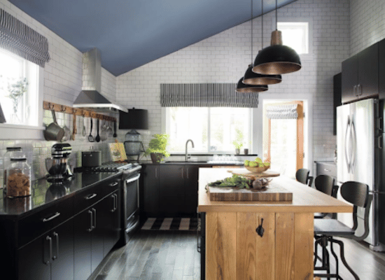 incorporate earthy elements with black kitchen cabinet doors