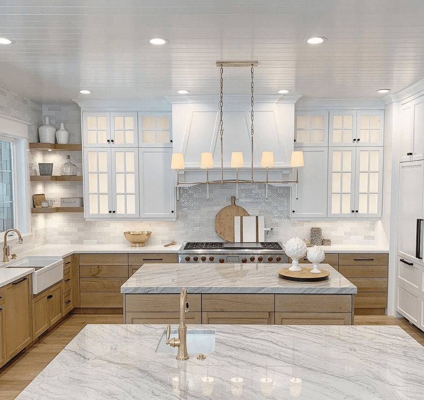 Modern white oak kitchen cabinets with white marble countertops