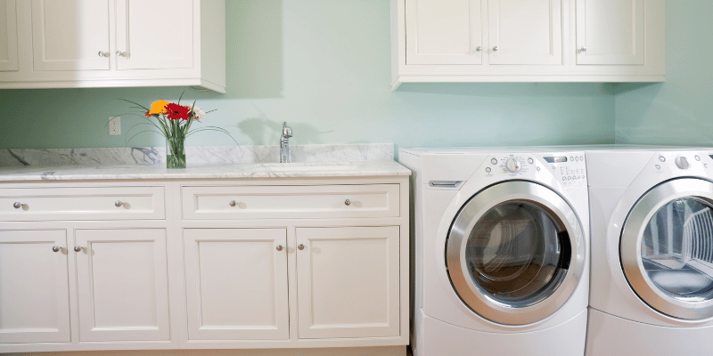 white laundry room cabinets